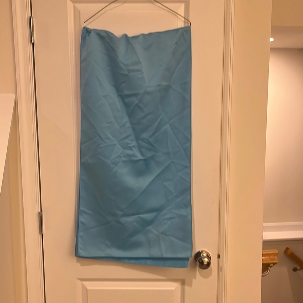 Prom shawl baby blue needs ironing, dry cleaning